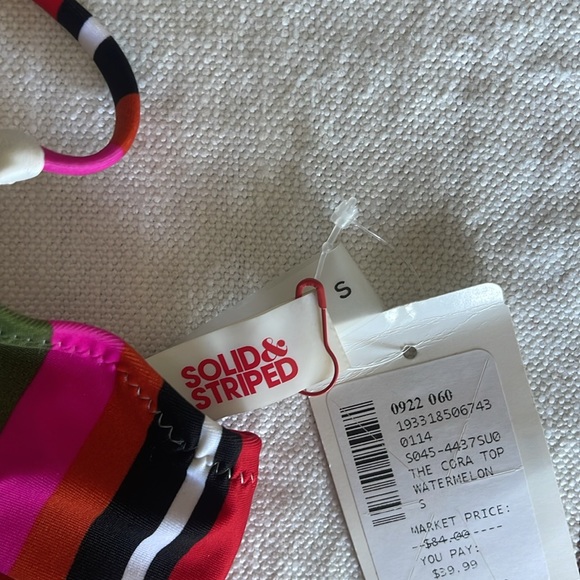Solid and striped bikini top and bottoms size small
Top runs small - Picture 5 of 10